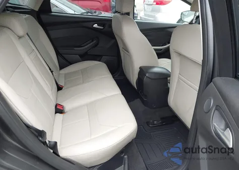 2015 Ford Focus Titanium from USA, damaged, VIN 1FADP3N21FL322359